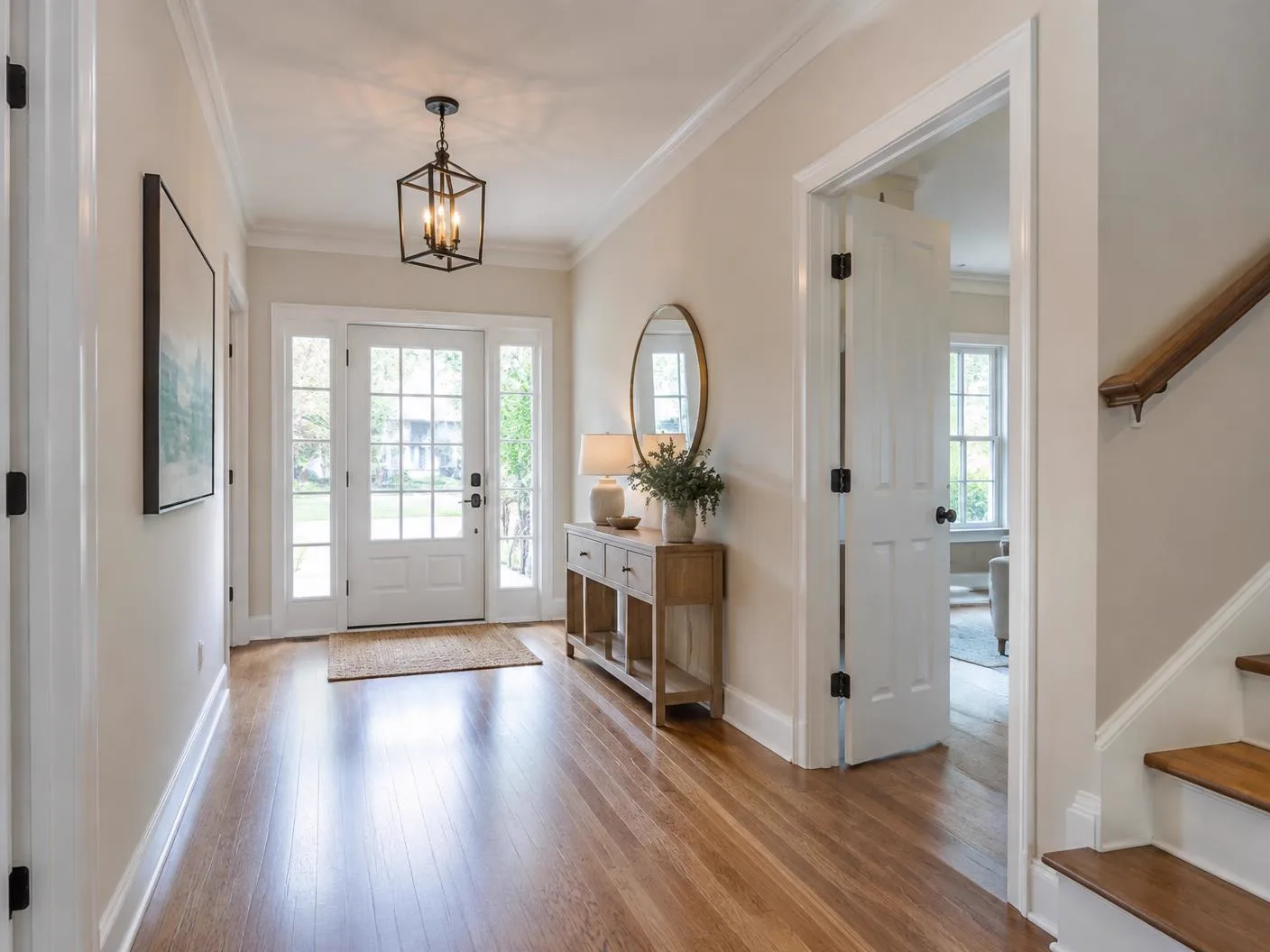 Bright entryway and hallway of a freshly remodeled home