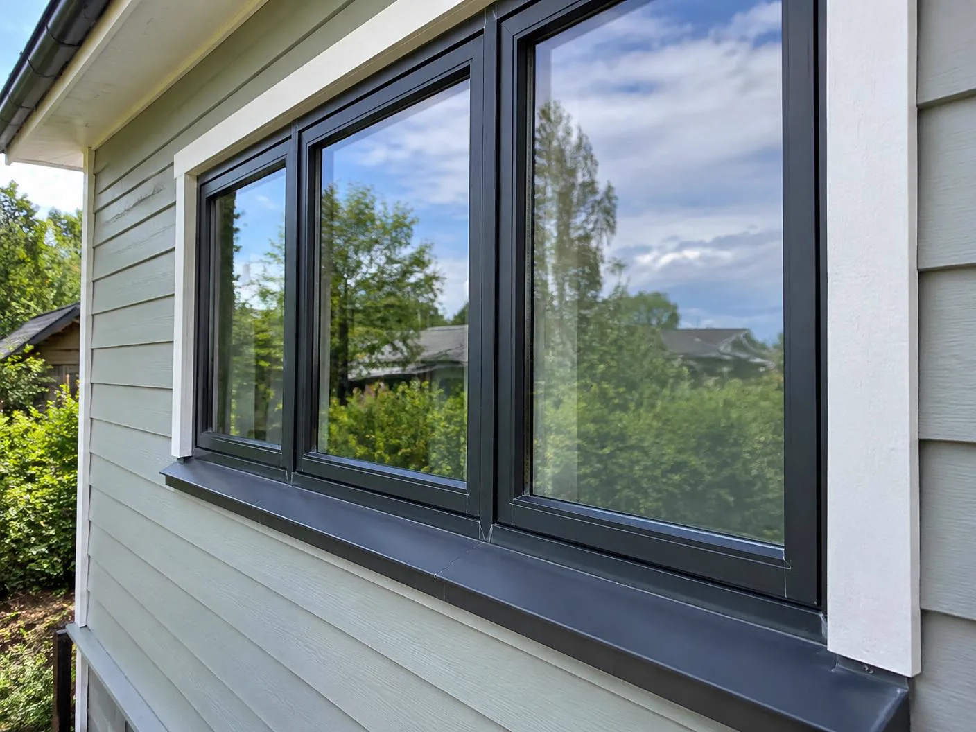 Exterior residential window frames and trim against siding